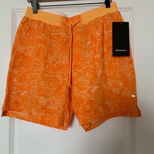 NWT Men’s Lululemon License To Train 7” LL Shorts. Medium. Ember Radiate Mango.